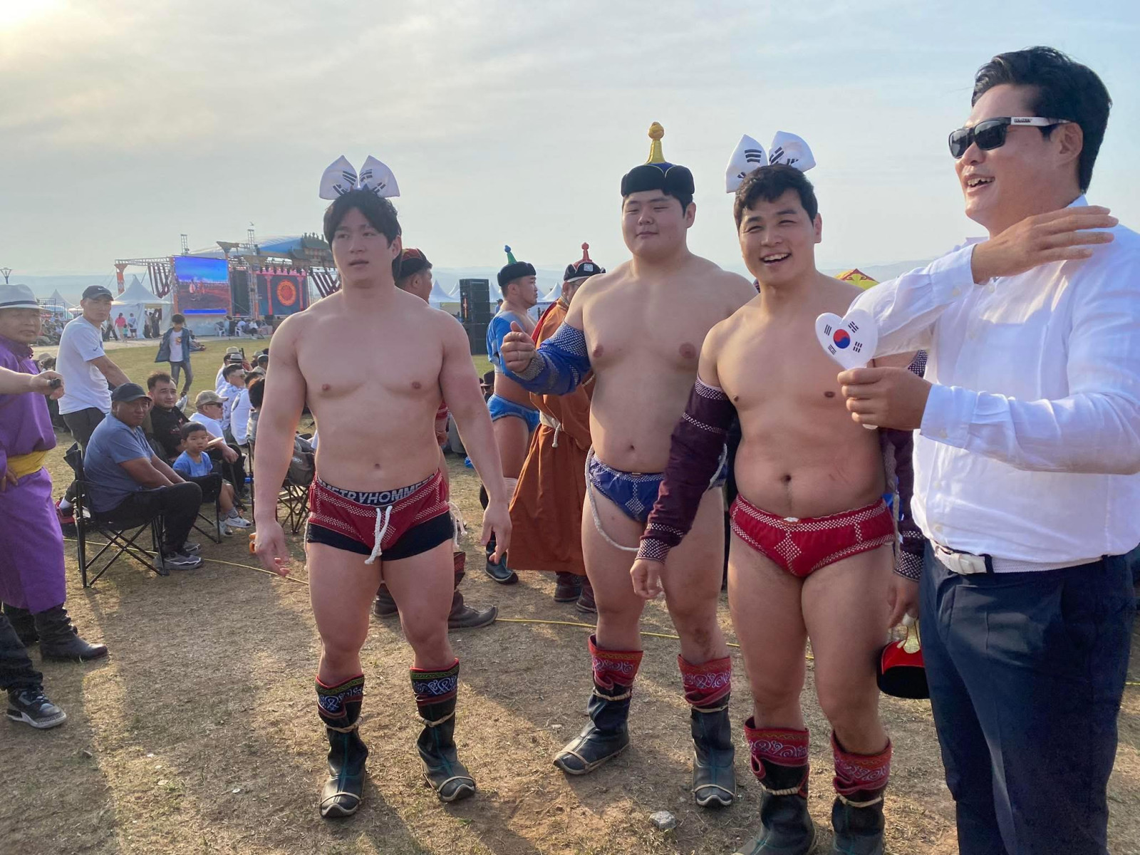 "Physical Asia"-д оролцож буй БНСУ-ын багийн гишүүн Ким Мин Жэ өнгөрсөн зун болсон Өндөр гэгээний Даншиг наадамд зодоглож байжээ